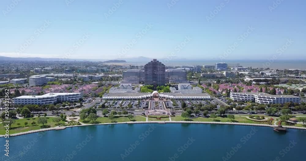 aerial water front view of metro center tower in foster city near Visa Global HQ on hills dale blvd drone fly forward aerial water front view of metro center tower in foster city near Visa Global HQ on hills dale blvd drone fly forward