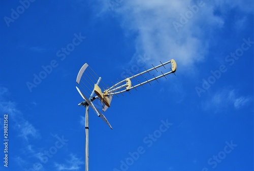 an antenna on a blue sky background
