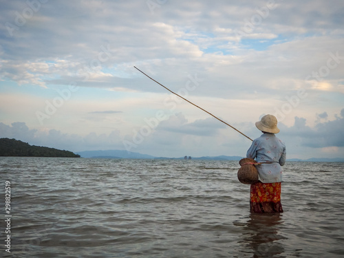 Asian woman is fishing