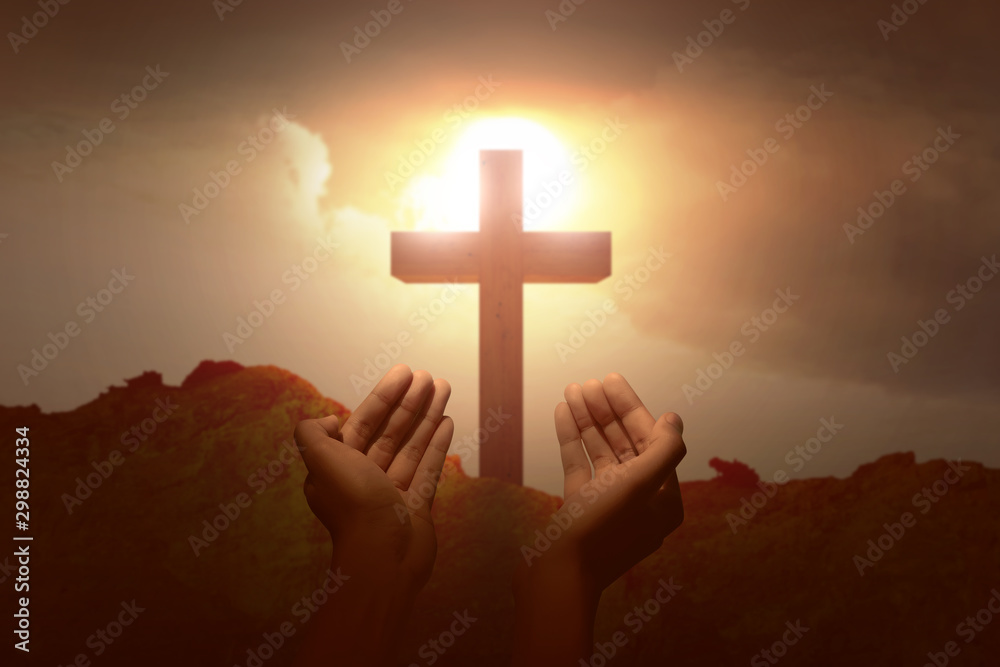 A human raised hands praying with to god