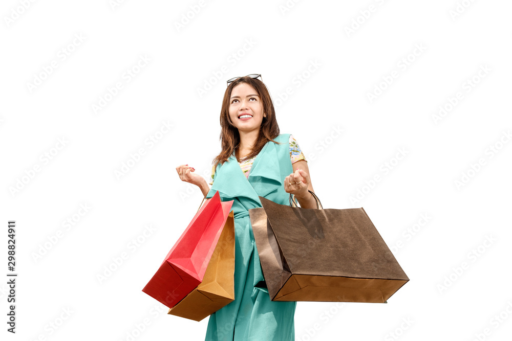 Asian woman with sunglasses carrying shopping bags Asian woman with sunglasses carrying shopping bags