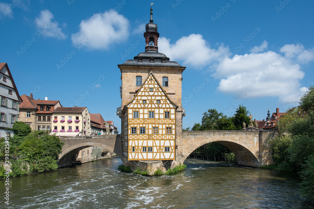 Bamberg, Germany - July 14, 2019; View on the old town hall in the center of Bamberg a popular tourist destination with ancient center with bridges, flowers and timbered houses