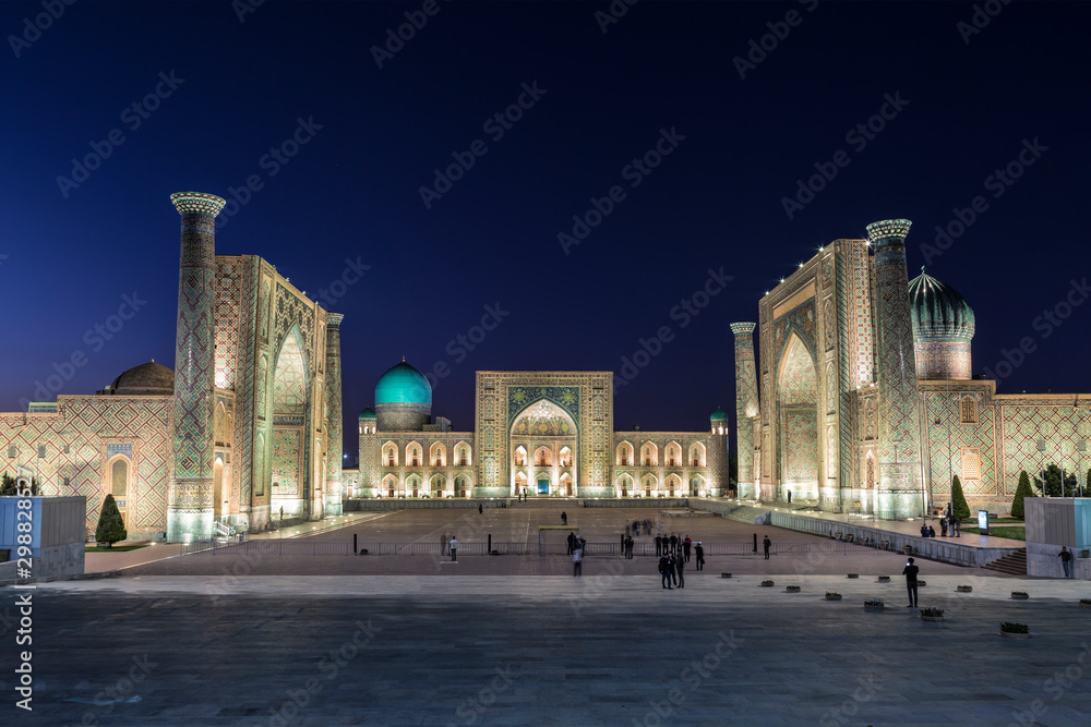 View of Registan square in Samarkand with Ulugbek madrassas, Sherdor madrassas and Tillya-Kari madrassas at night with  backlight. Uzbekistan