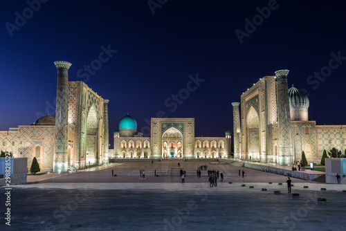 View of Registan square in Samarkand with Ulugbek madrassas, Sherdor madrassas and Tillya-Kari madrassas at night with backlight. Uzbekistan