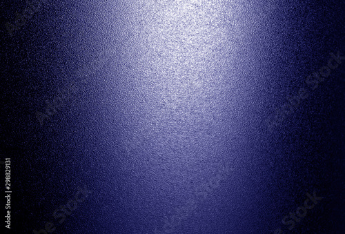 Ground glass texture with light in blue tone.