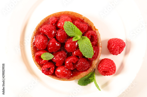 appetizing raspberry tart and mint