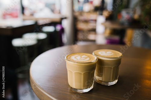 Two glasses of cappuccino.