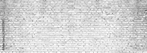 Panoramic background of old vintage white brick wall © uv_group