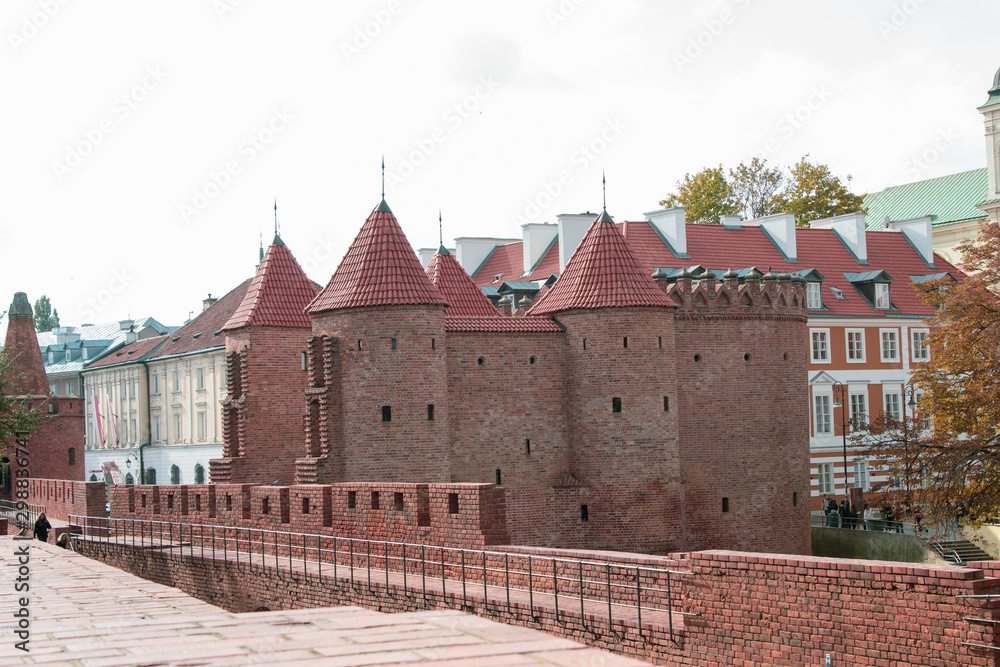 Warsaw/ Poland - October 09 2019: Panoramic view of the restored main defensive tower and the fortifications of the old city of the Polish capital Warsaw.