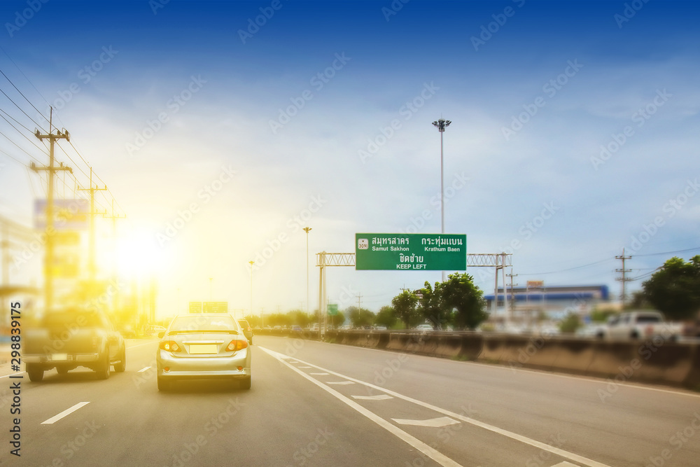 Car driving on road,Cars on road and blue sky sunligh Car driving on road,Cars on road and blue sky sunligh