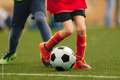 Children Running With Soccer Ball © matimix