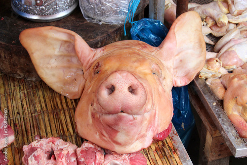 Fresh pork head sold in a market