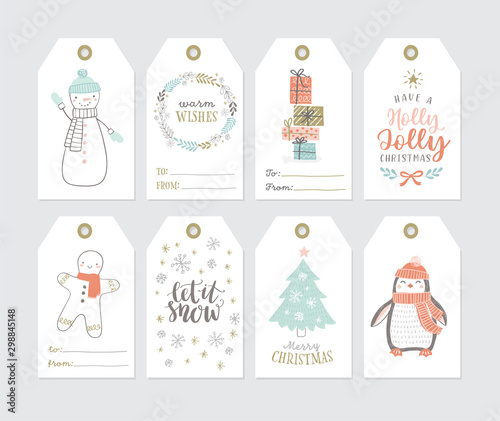 Set of cute Christmas gift tags in hand drawn doodle style. Vector greeting card designs with lettering and illustrations of winter wreath, snowman, penguin, gift boxes, gingerman, christmas tree.