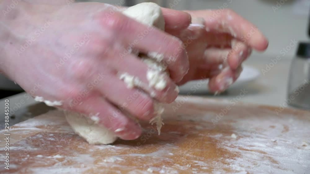 Hands of woman kneading dough Hands of woman kneading dough