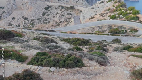 A steady view of cap formentor street  with limestone mountains and zic zac narrow roads from resort balcony, A romantic getaway nestled along the coast of the Mediterranean. Mallorca photo