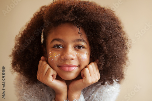 Cute beautiful girl with shiny makeup