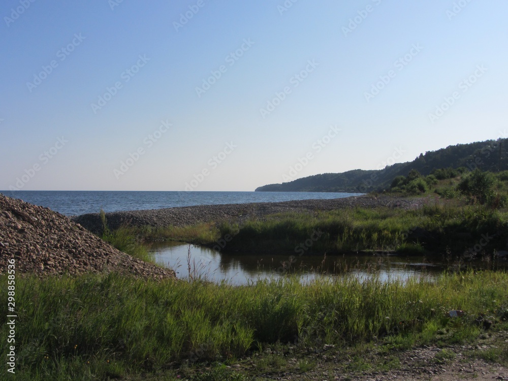 landscape with lake and blue sky landscape with lake and blue sky