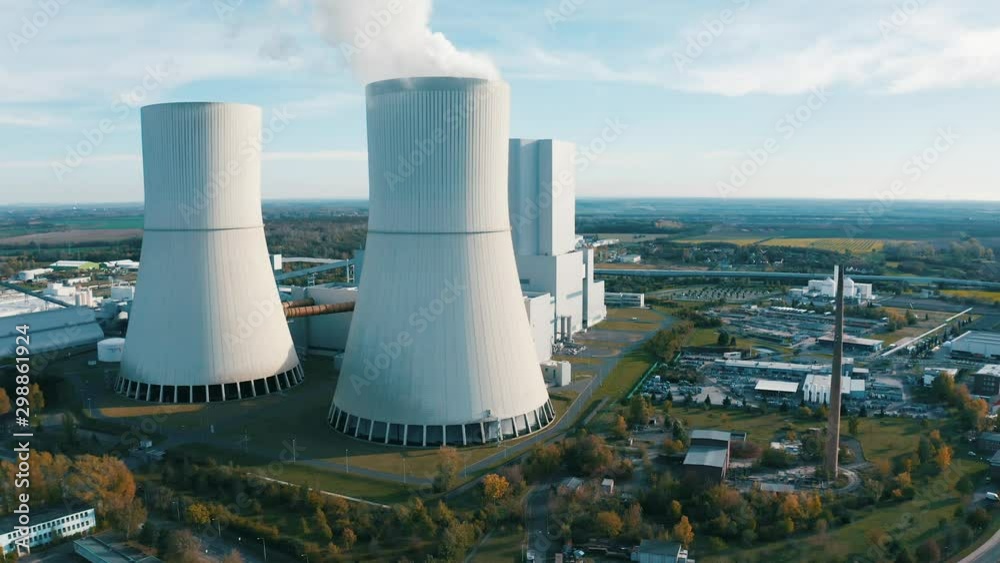 Top aerial view of a working coal burning power plant at an industrial zone