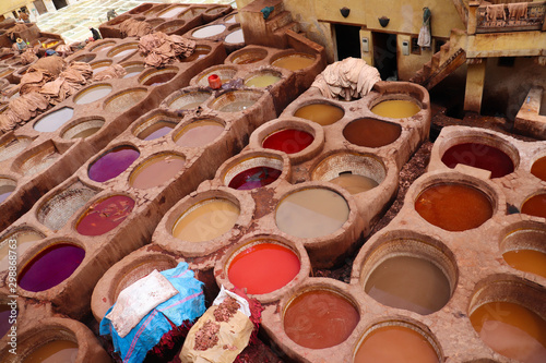 Different colored leather tanneries in the medina of Fes in Morocco © Arshii