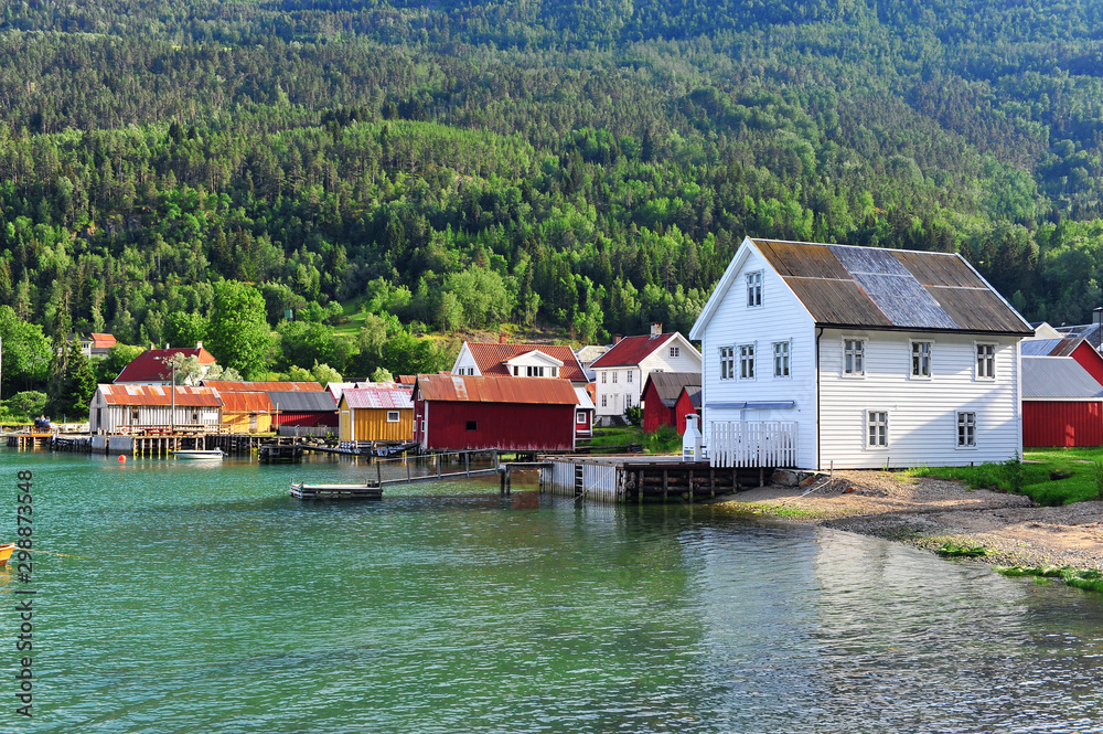 Beautiful houses of Solvorn village on lake