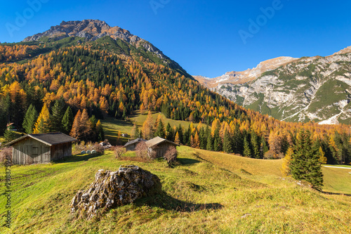 Autumn mountains rural scene. Hiking in Austrian Alps, Tyrol, Austria. photo