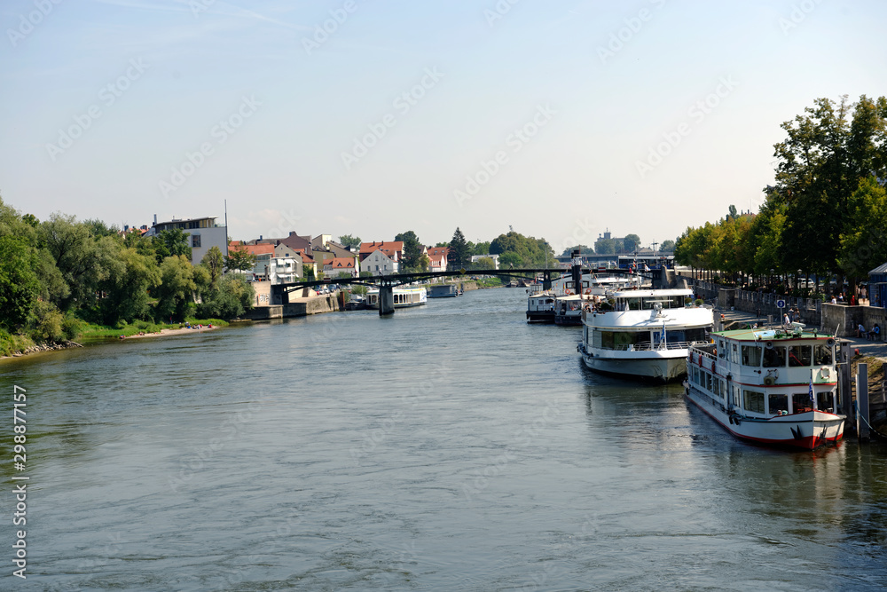 River Danube tour boats docked at Regensburg in Bavaria, Germany
