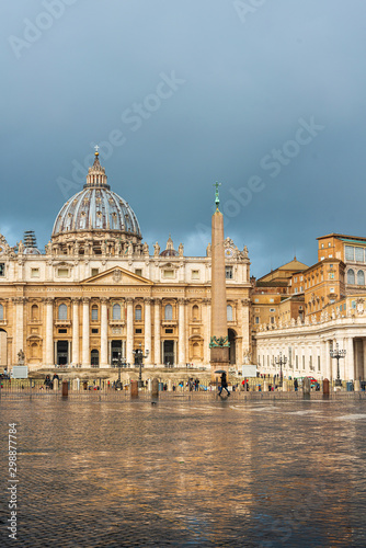 VATICAN CITY,VATICAN - January 18, 2018: Tourists on foot Saint Peter's Square in Vatican, the smallest internationally recognized independent state in the world.