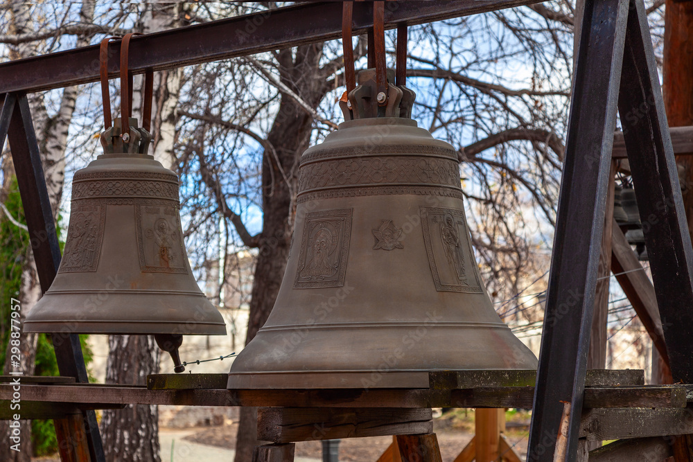 Two bronze church bells of different sizes