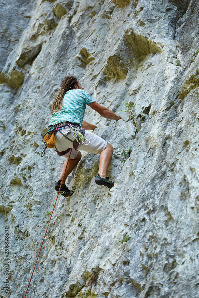Obraz premium Climber on a wall