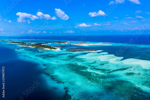 Fototapeta Naklejka Na Ścianę i Meble -  Aerial view, lagoon of Maldives island Olhuveli with water bungalows South Male Atoll, Maldives