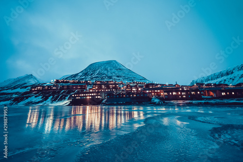The polar arctic Northern lights hunting aurora borealis sky star in Norway travel photographer Svalbard in Longyearbyen city the moon mountains