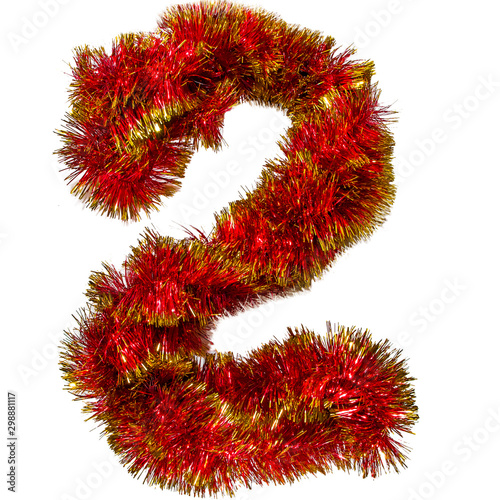 Symbol of the New Year from Christmas tinsel  holiday numbers isolated on white background.