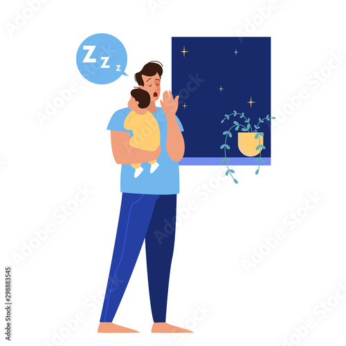 Father holding sleeping baby