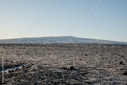 Landscape with first snow near Húsfell. In the background the mountain Ok. Formally, the mountain was covered by a glacier, the Okjökull.  photo