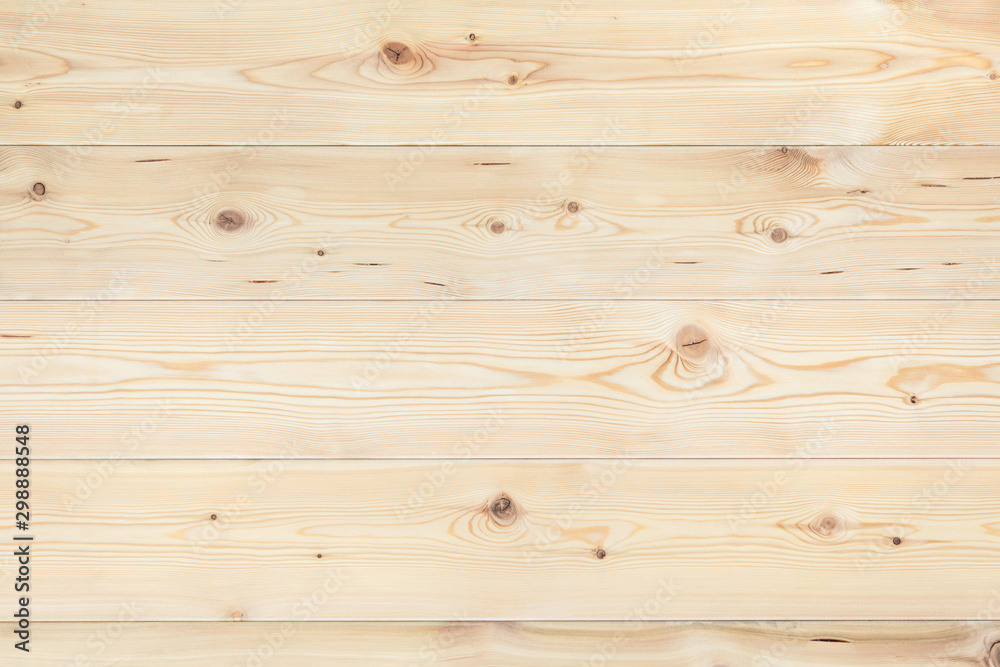 Natural beige wood plank texture background. Wavy textured wood, a lot of fiber and small chips, close-up abstract tree background for design, decor and skins