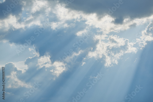Fototapeta Naklejka Na Ścianę i Meble -  Inspirational light shining through clouds. The sun rays break through the clouds.