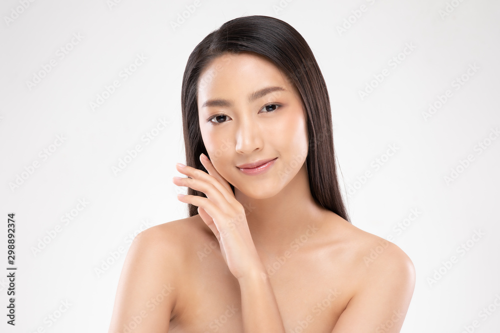 Beautiful Asian young woman touching soft cheek smile with clean and fresh skin Happiness and cheerful with positive emotional,isolated on white background,Beauty and Cosmetics Concept