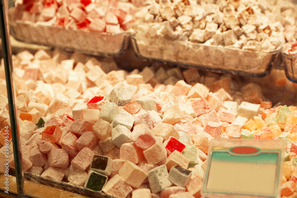 Shop with turkish delight, view through window glass Shop with turkish delight, view through window glass
