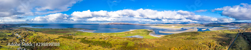 Aerial view of the coastline seen from Clooney towards Portnoo and Lettermacaward County Donegal . Ireland