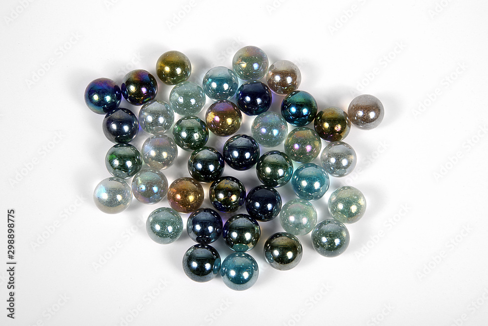 Colored glass bullets on white ground isolated Colored glass bullets on white ground isolated