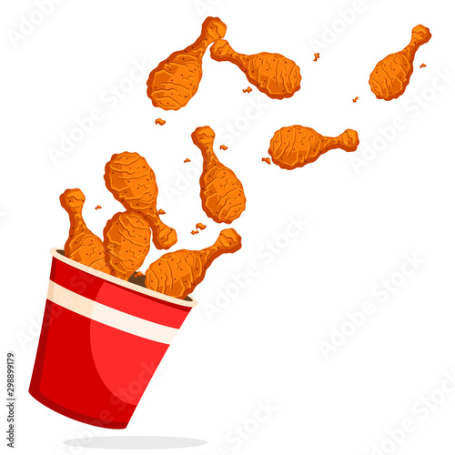 Fried chicken legs flew out of the bucket on a white background.