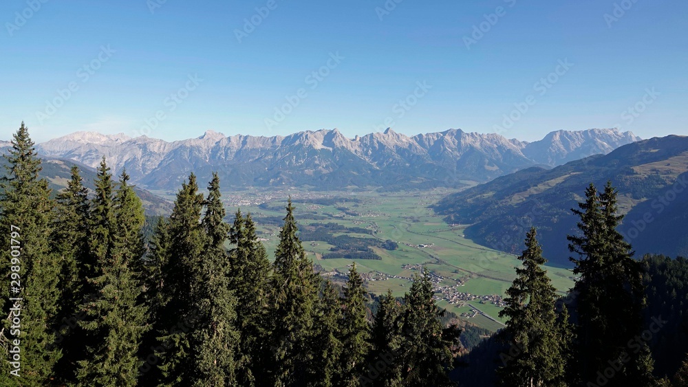 a wonderful sunny day on the mountain with a beautiful view to the alps over the valley