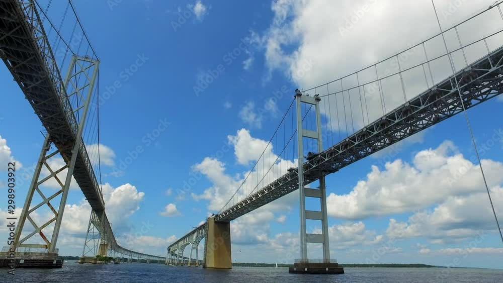 Wide Angle: Boats Sitting Under the Two Large Bridges in the Chesapeake Bay in Annapolis, Maryland Wide Angle: Boats Sitting Under the Two Large Bridges in the Chesapeake Bay in Annapolis, Maryland