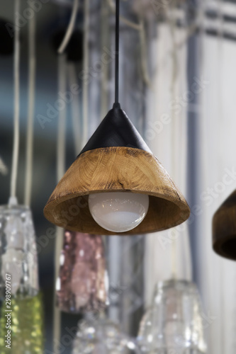 Beautiful wooden modern ceiling lamp interior contemporary decoration. selective focus