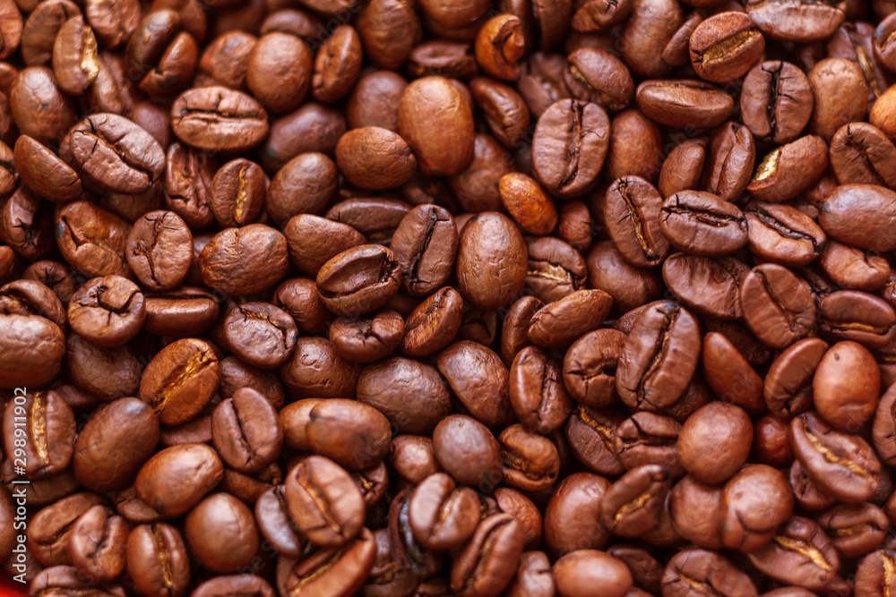 Roasted aromatic brown coffee beans background Roasted aromatic brown coffee beans background