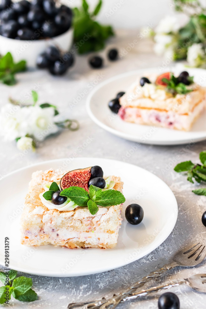 Pavlova on a biscuit with a gentle curd cream and fruit. Pavlova on a biscuit with a gentle curd cream and fruit.