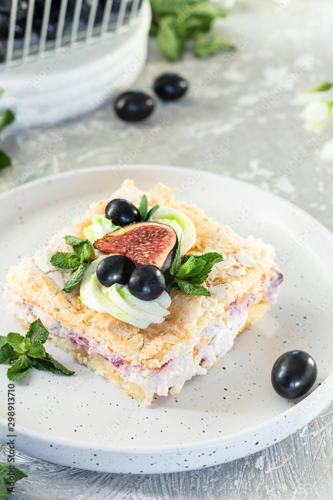 Pavlova on a biscuit with a gentle curd cream and fruit. Pavlova on a biscuit with a gentle curd cream and fruit.