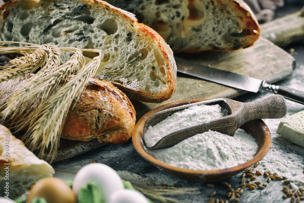 Bread products on the table in composition - close-upм Bread products on the table in composition - close-upм