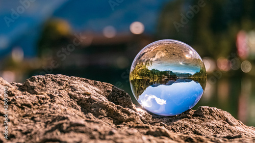 Crystal ball alpine landscape shot at the famous Pillersee, Tyrol, Austria
