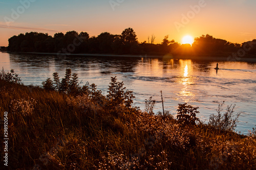 Beautiful sunset with reflections near Osterhofen, Danube, Bavaria, Germany photo